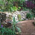 Stone wall and mosaic pond©Kim Woods&nbsp;Rabbidge